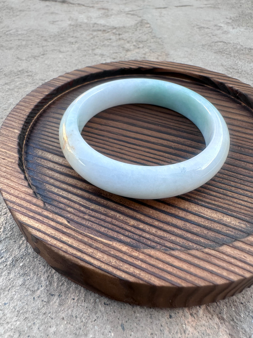 Icy White-Green Jadeite Bangle with Natural Sajin (Sz 52.5)