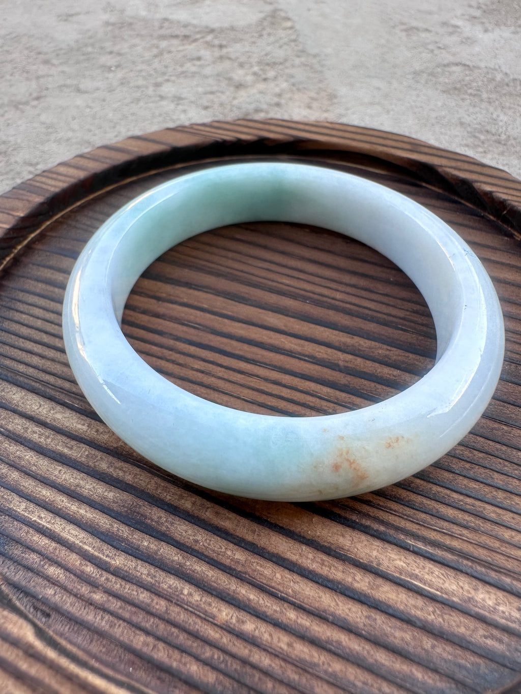 Icy White-Green Jadeite Bangle with Natural Sajin (Sz 52.5)